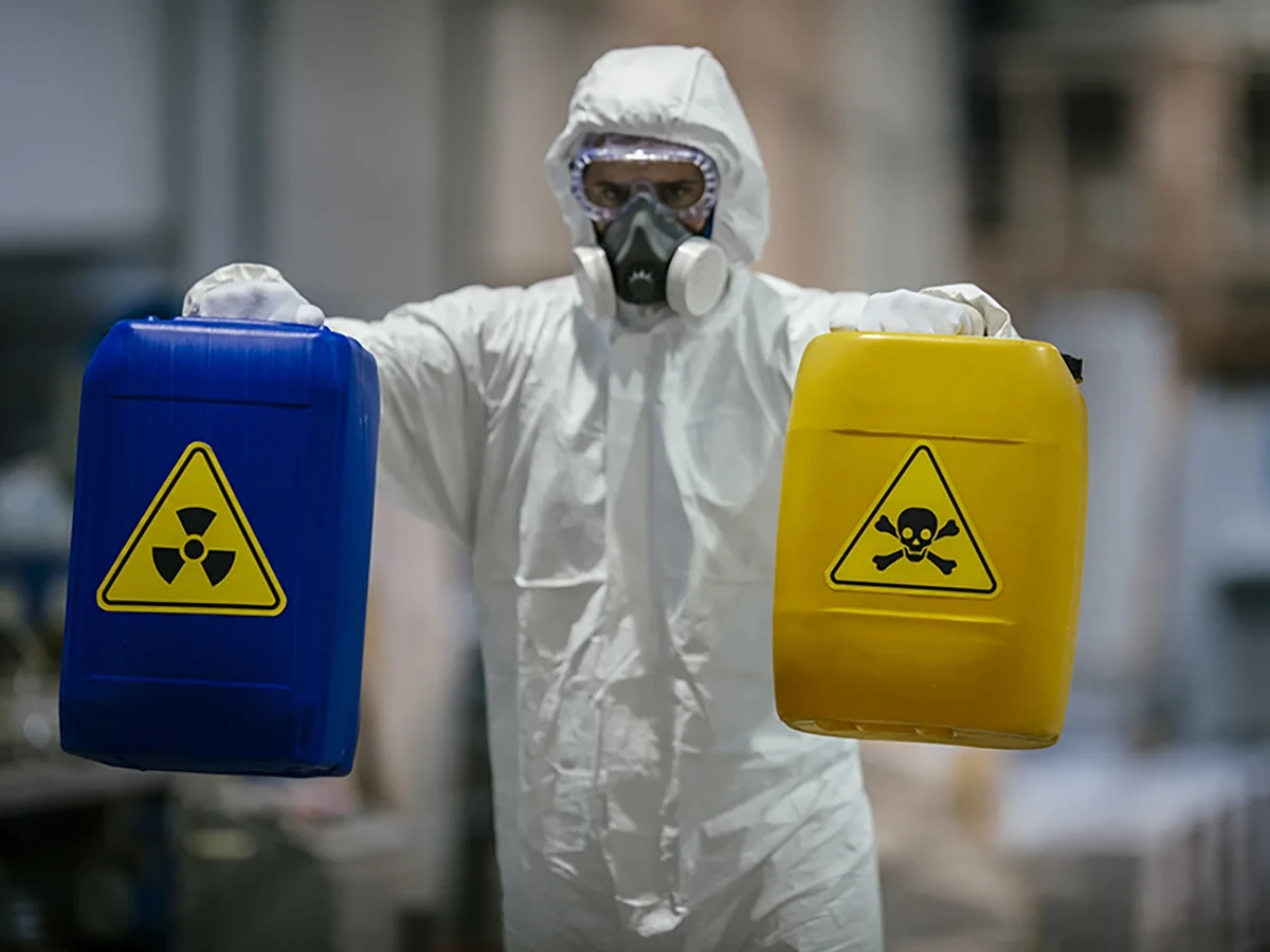Biohazard cleanup technicians in protective equipment at a remediation scene in Woodinville, WA